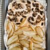 roasted potato wedges and mushrooms on the tray