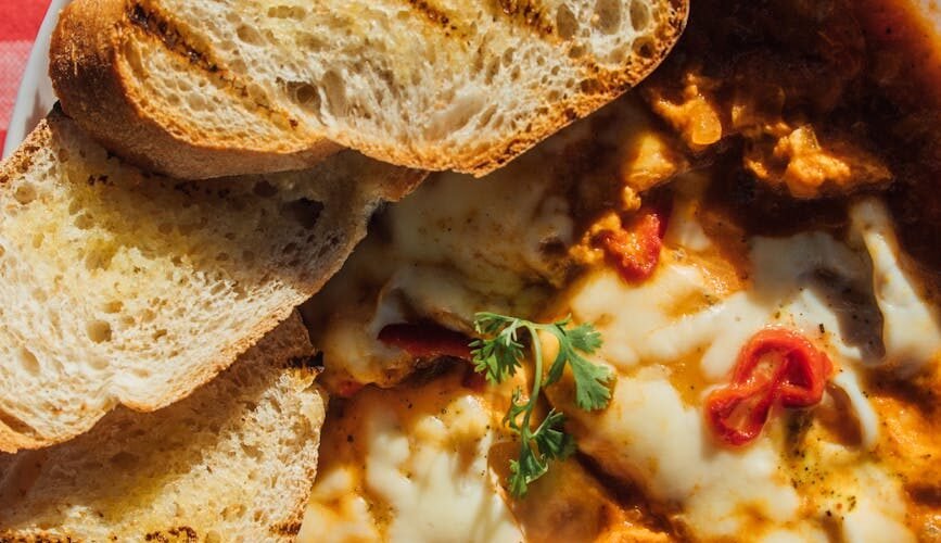 delicious shakshuka with grilled bread